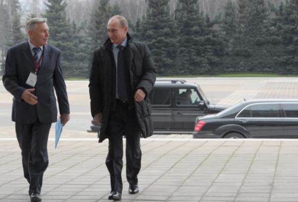 With Russian President Vladimir Putin